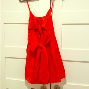 NWT Red Romper with front ties and pockets